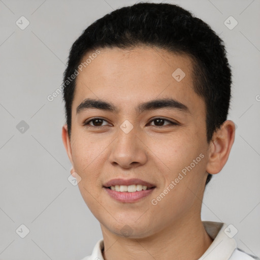 Joyful latino young-adult male with short  black hair and brown eyes