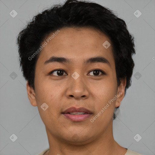 Joyful asian young-adult male with short  black hair and brown eyes