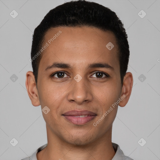 Joyful white young-adult male with short  black hair and brown eyes