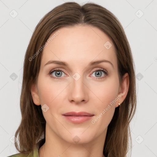 Joyful white young-adult female with long  brown hair and green eyes