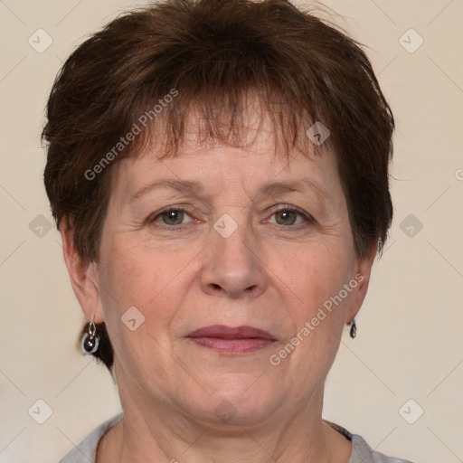 Joyful white adult female with short  brown hair and grey eyes