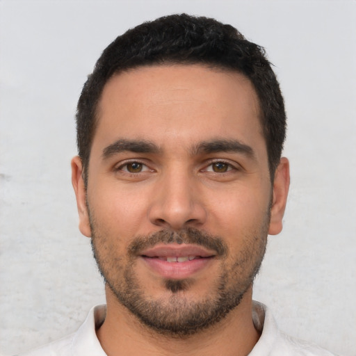 Neutral white young-adult male with short  black hair and brown eyes