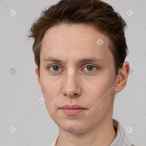 Neutral white adult male with short  brown hair and grey eyes