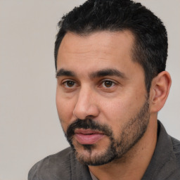Neutral white adult male with short  black hair and brown eyes