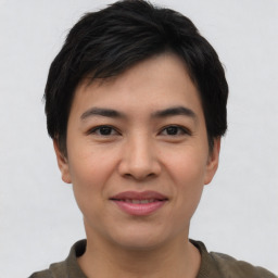 Joyful asian young-adult female with short  black hair and brown eyes