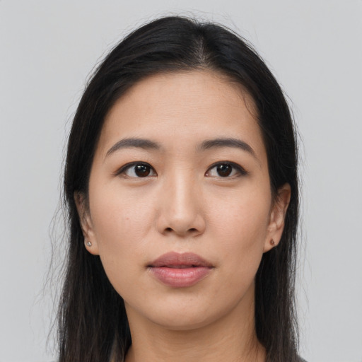 Neutral asian young-adult female with long  brown hair and brown eyes