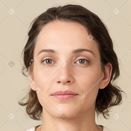 Neutral white young-adult female with medium  brown hair and grey eyes