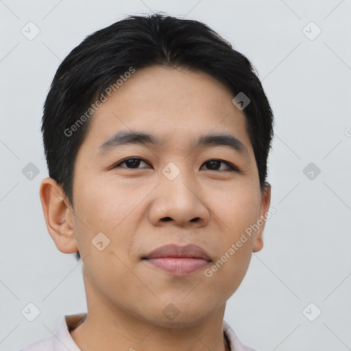 Joyful asian young-adult male with short  black hair and brown eyes