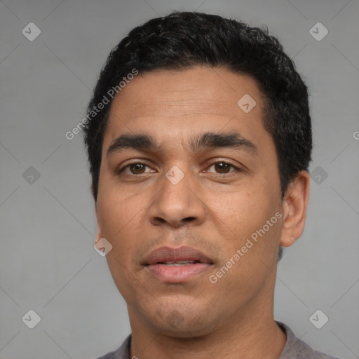 Neutral latino young-adult male with short  black hair and brown eyes