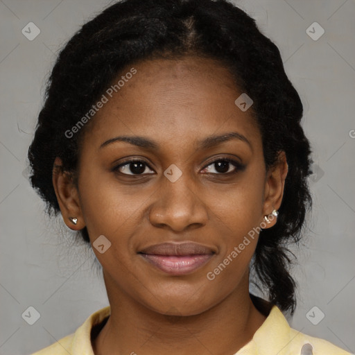 Joyful black young-adult female with medium  brown hair and brown eyes