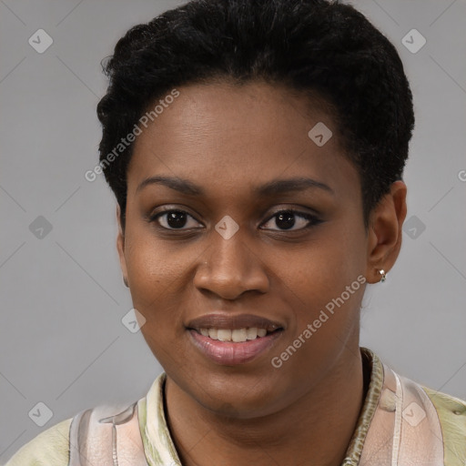 Joyful black young-adult female with short  black hair and brown eyes