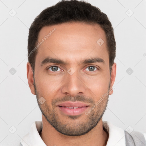 Joyful white young-adult male with short  brown hair and brown eyes