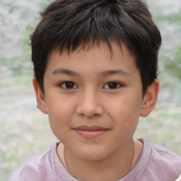 Joyful white child male with short  brown hair and brown eyes