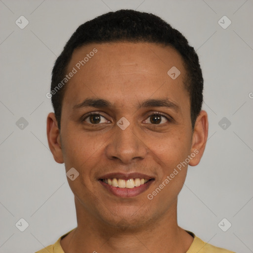 Joyful latino young-adult male with short  black hair and brown eyes