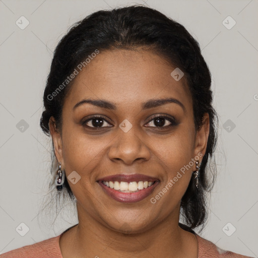 Joyful black young-adult female with medium  brown hair and brown eyes