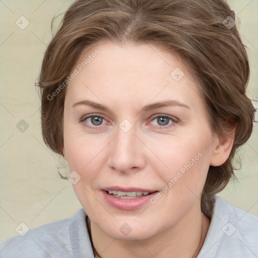 Joyful white young-adult female with medium  brown hair and blue eyes