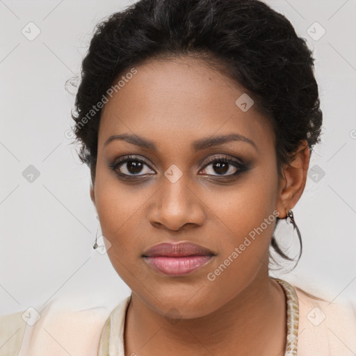 Joyful black young-adult female with long  brown hair and brown eyes