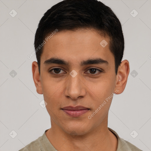 Joyful latino young-adult male with short  black hair and brown eyes