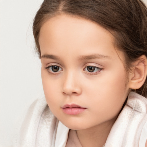 Neutral white child female with medium  brown hair and brown eyes