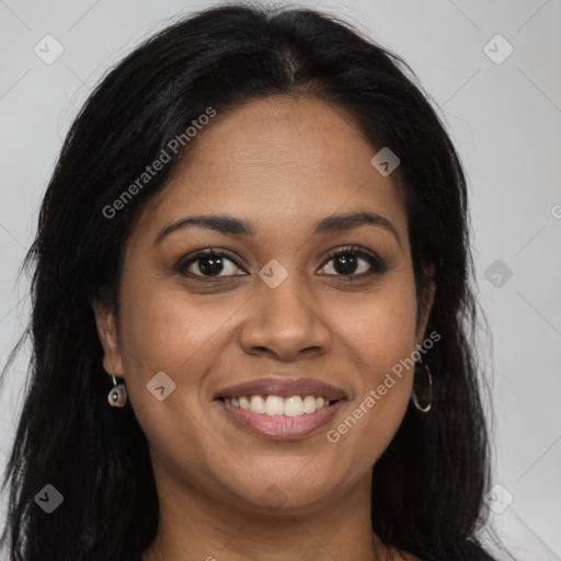 Joyful latino young-adult female with long  brown hair and brown eyes