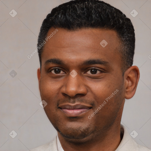 Joyful black young-adult male with short  black hair and brown eyes
