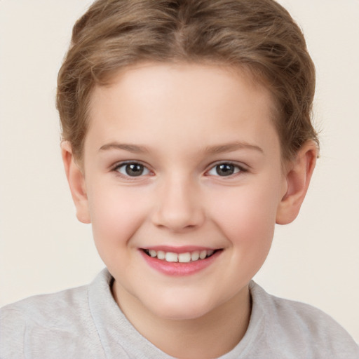 Joyful white child female with short  brown hair and brown eyes