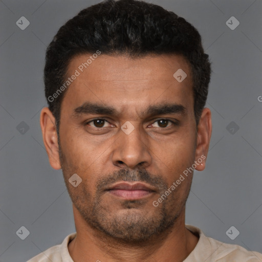 Neutral latino young-adult male with short  black hair and brown eyes