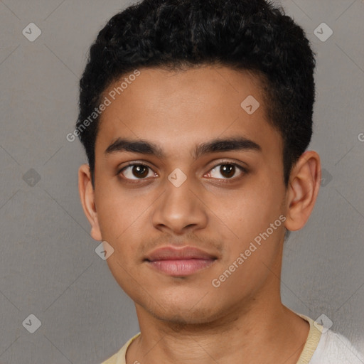 Neutral latino young-adult male with short  black hair and brown eyes