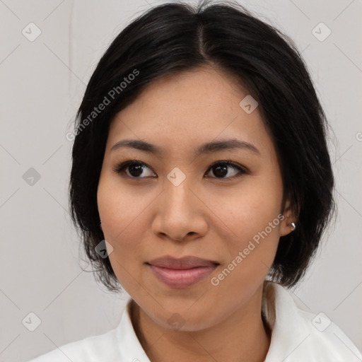 Joyful asian young-adult female with medium  black hair and brown eyes