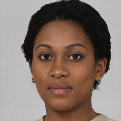 Neutral black young-adult female with short  black hair and brown eyes