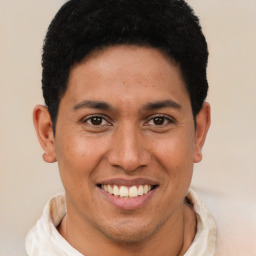 Joyful latino young-adult male with short  brown hair and brown eyes