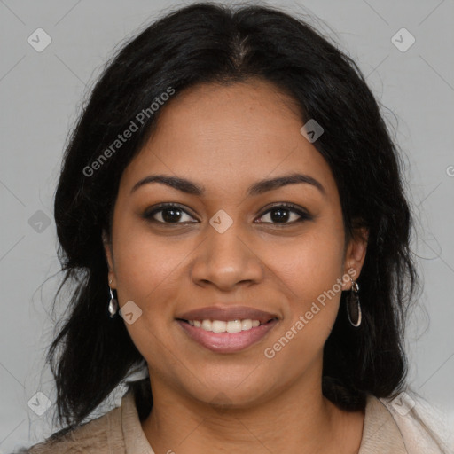 Joyful latino young-adult female with long  brown hair and brown eyes
