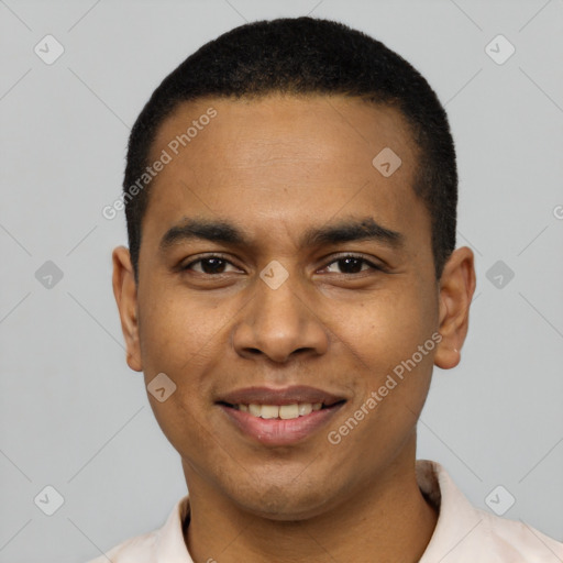 Joyful black young-adult male with short  black hair and brown eyes