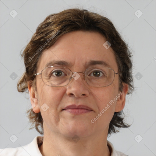 Joyful white adult female with short  brown hair and grey eyes