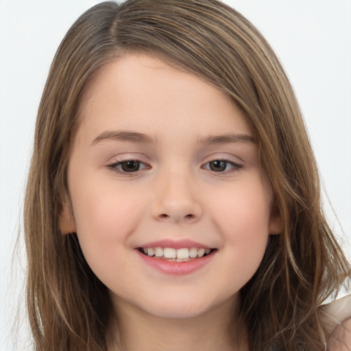 Joyful white child female with long  brown hair and brown eyes