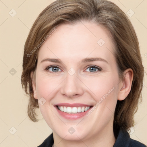 Joyful white young-adult female with medium  brown hair and grey eyes