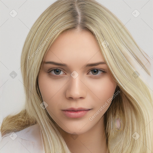 Neutral white young-adult female with long  brown hair and brown eyes