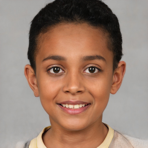 Joyful latino child female with short  brown hair and brown eyes