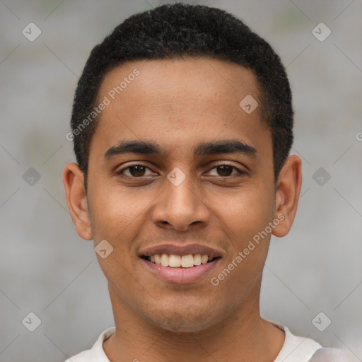 Joyful latino young-adult male with short  brown hair and brown eyes