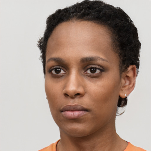Neutral black young-adult female with short  black hair and brown eyes