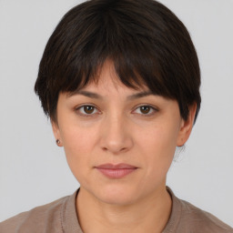 Neutral white young-adult female with short  brown hair and brown eyes