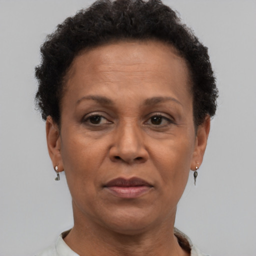 Neutral black adult female with short  brown hair and brown eyes