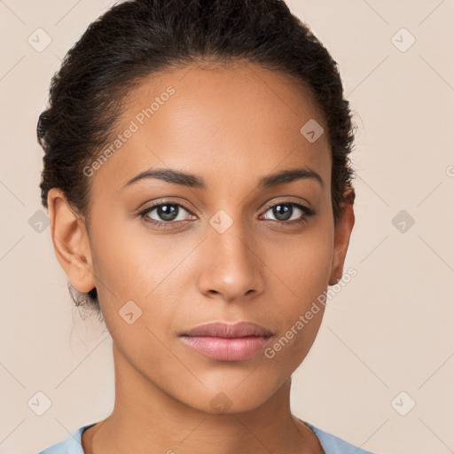 Joyful latino young-adult female with short  brown hair and brown eyes