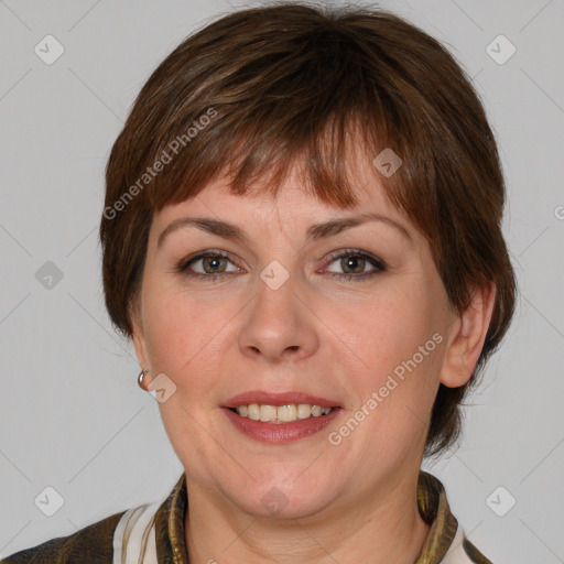 Joyful white adult female with medium  brown hair and grey eyes