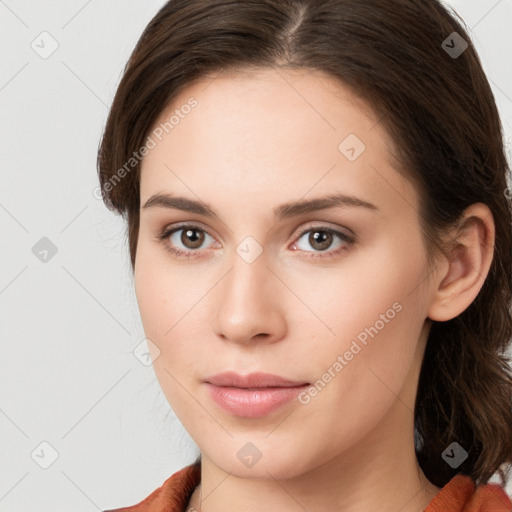 Neutral white young-adult female with medium  brown hair and brown eyes