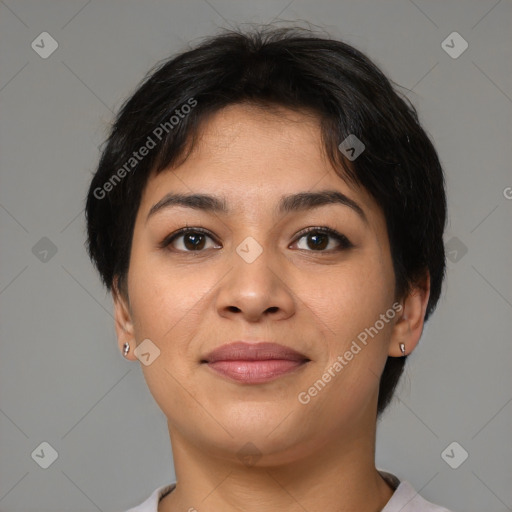 Joyful latino young-adult female with short  black hair and brown eyes