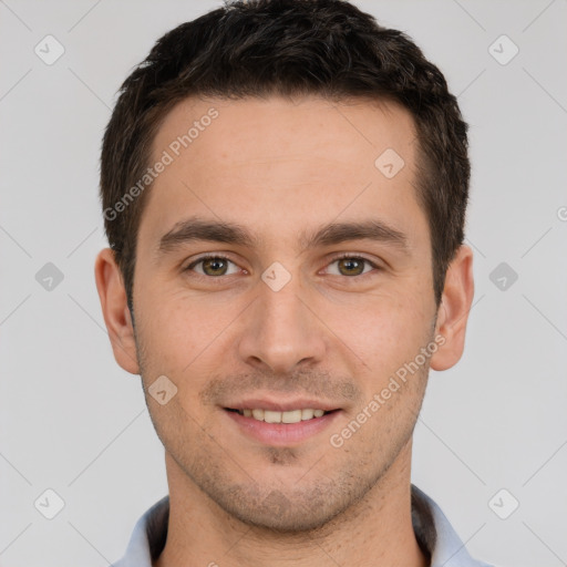 Joyful white young-adult male with short  brown hair and brown eyes