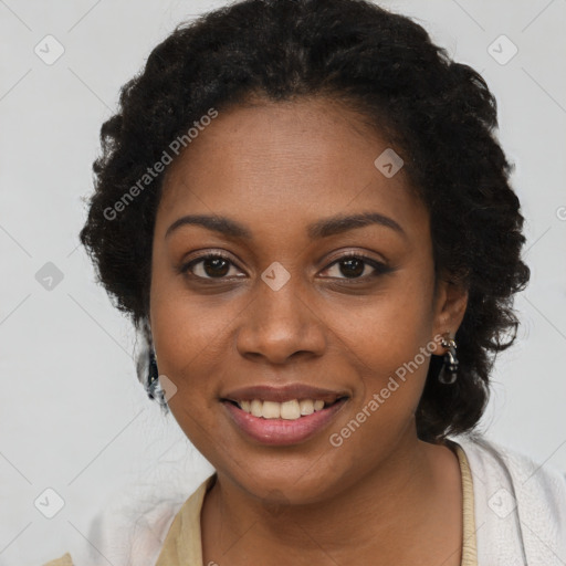 Joyful black young-adult female with long  brown hair and brown eyes