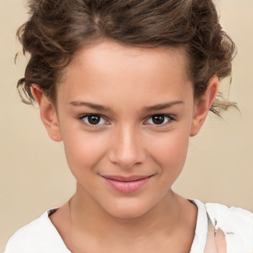 Joyful white child female with short  brown hair and brown eyes