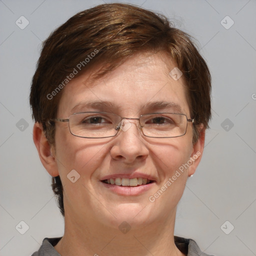 Joyful white adult female with short  brown hair and brown eyes